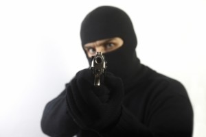 4998061-robber-points-a-gun